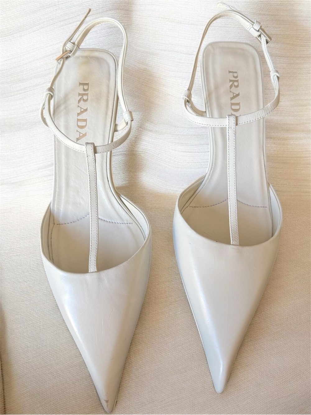 Prada Cream Leather T‑Strap Pointed-Toe Slingback Heels